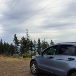 car driving on a budget road trip
