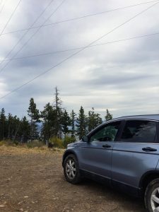 car driving on a budget road trip