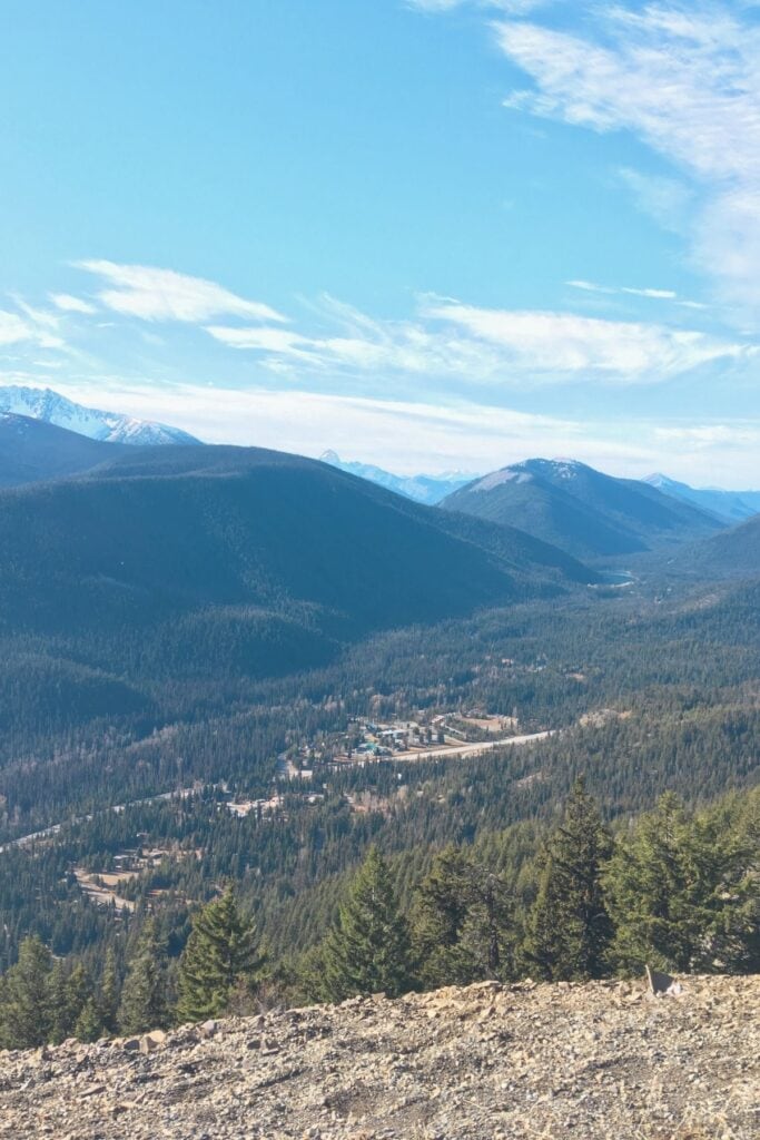 A wide mountain view looks down over Manning Park Resort and the surrounding forested valley. This viewpoint gives a clear sense of how tucked into the mountains Manning Park really is.